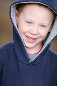 Boy in blue sweater