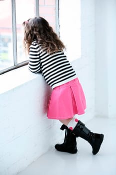 Girl looking out the window