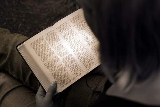 Woman reading the Bible