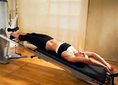 Woman on exercise machine