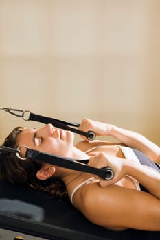 Woman on exercise machine