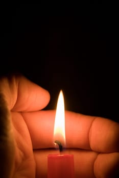 Hand and candle