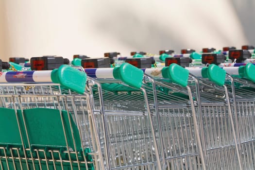 Shopping carts Rows of shopping trolleys outside supermarket
