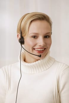 Woman wearing telephone headset
