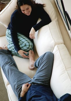Couple hanging out on sofa