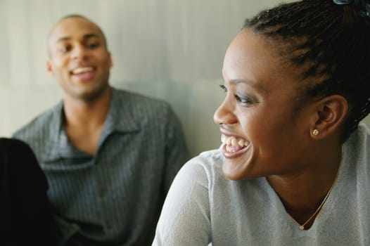 Woman listens to man