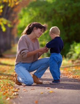 Mother and child in a park.