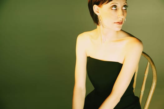 Woman wearing strapless black dress