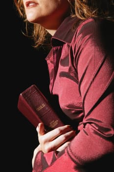Woman holding Bible