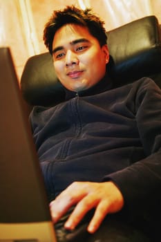 Man working on lap top computer