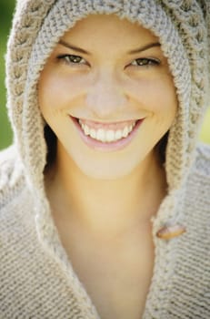 Woman wearing a knit hoodie