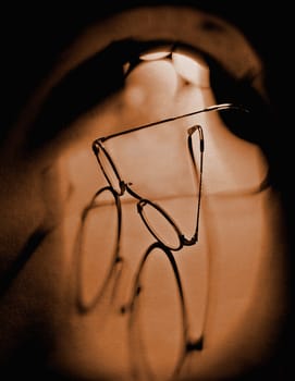 Eye glasses on bare back