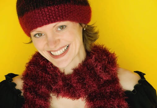 Woman modeling a winter hat and scarf