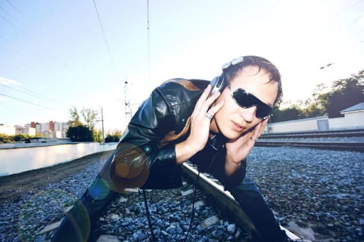 DJ listening to the rails