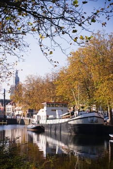 Ship in harbor on october morning