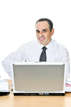 Businessman at his desk on white backgro