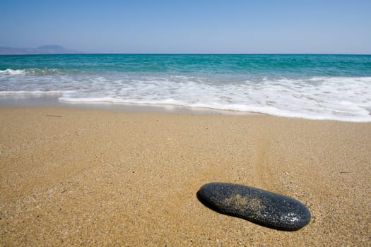 Beach with black stone