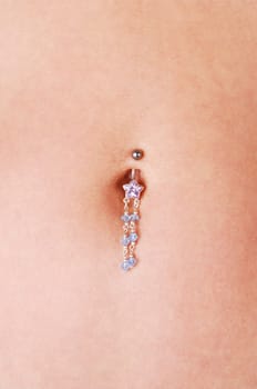 Belly button jewelry.