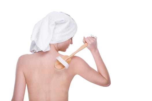 Young woman with back brush