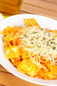 Italian pasta with cheese and tomato