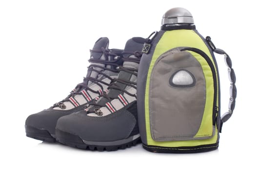 Hiking boots and canteen