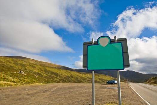 Blank billboard on blue sky