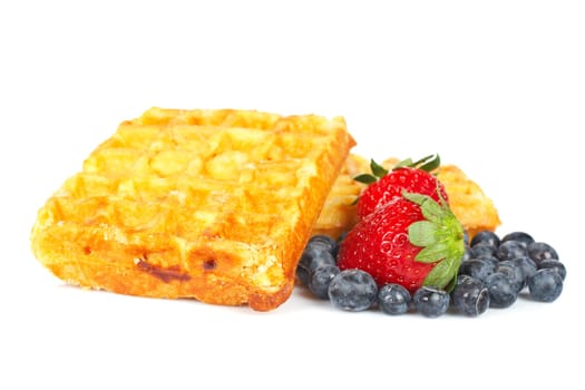 Waffles, blueberries and strawberries