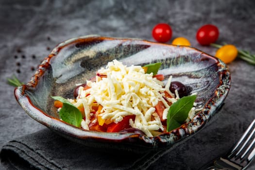 salad with tomatoes, basil, sweet peppers and cheese