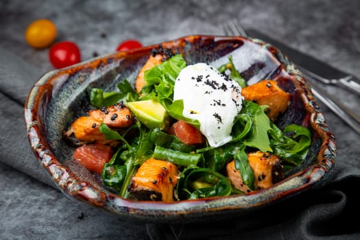 salad with red fish, herbs and lime