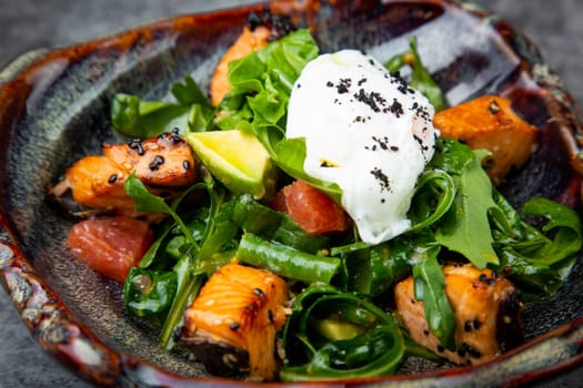 salad with red fish, herbs and lime