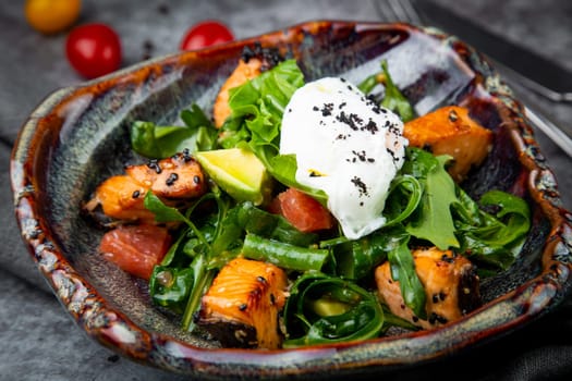 salad with red fish, herbs and lime