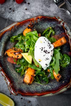 salad with red fish, herbs and lime