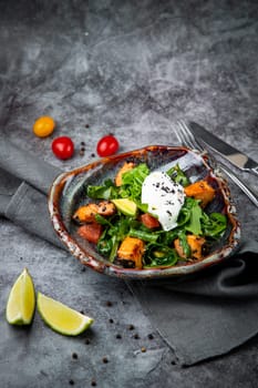 salad with red fish, herbs and lime