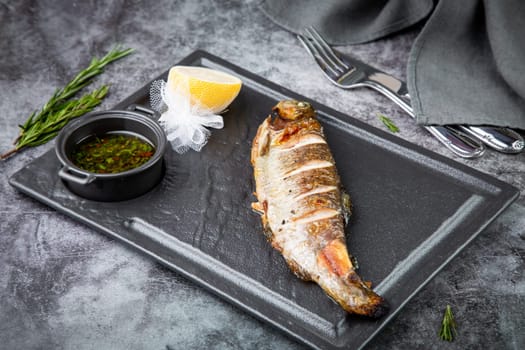 baked fish with broth and lemon