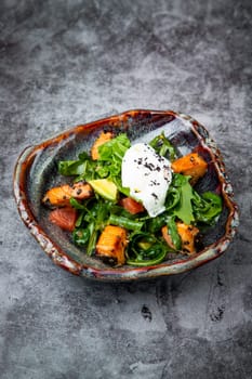 salad with red fish, herbs and lime