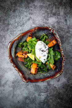 salad with red fish, herbs and lime