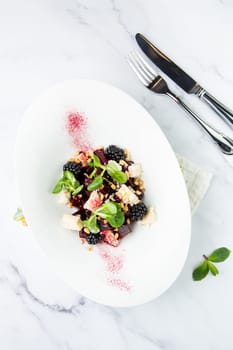 salad of blackberries, beets, seeds and cheese