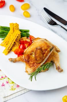 Grilled chicken with tomatoes and corn