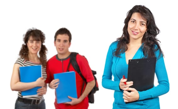 Three students with books and backpacks