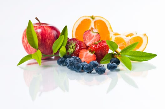 Colorful fruit mix on white background