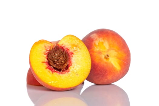 Two half of peach fruit