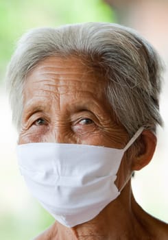 old asian woman with face mask