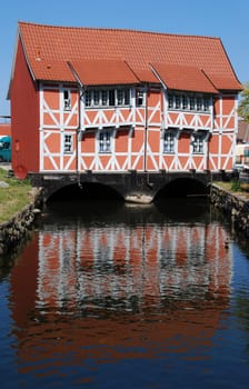 Half-timbered house with reflection