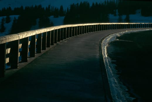 Walkway with bridge railing in backlight
