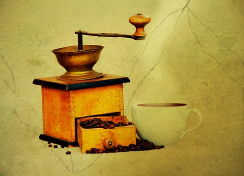 coffee mill and cup of hot black coffee