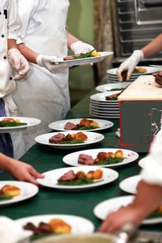 Chefs in the preparation and decoration of food