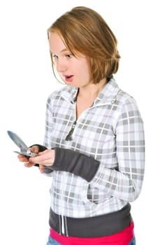 Teenage girl text messaging on a cell ph