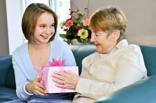 Granddaughter visiting grandmother