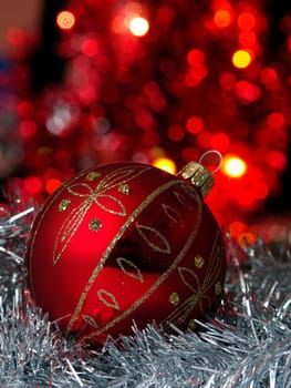 Christmas decoration - red ball with abstract background