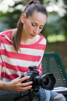 Woman takes a picture with the camera